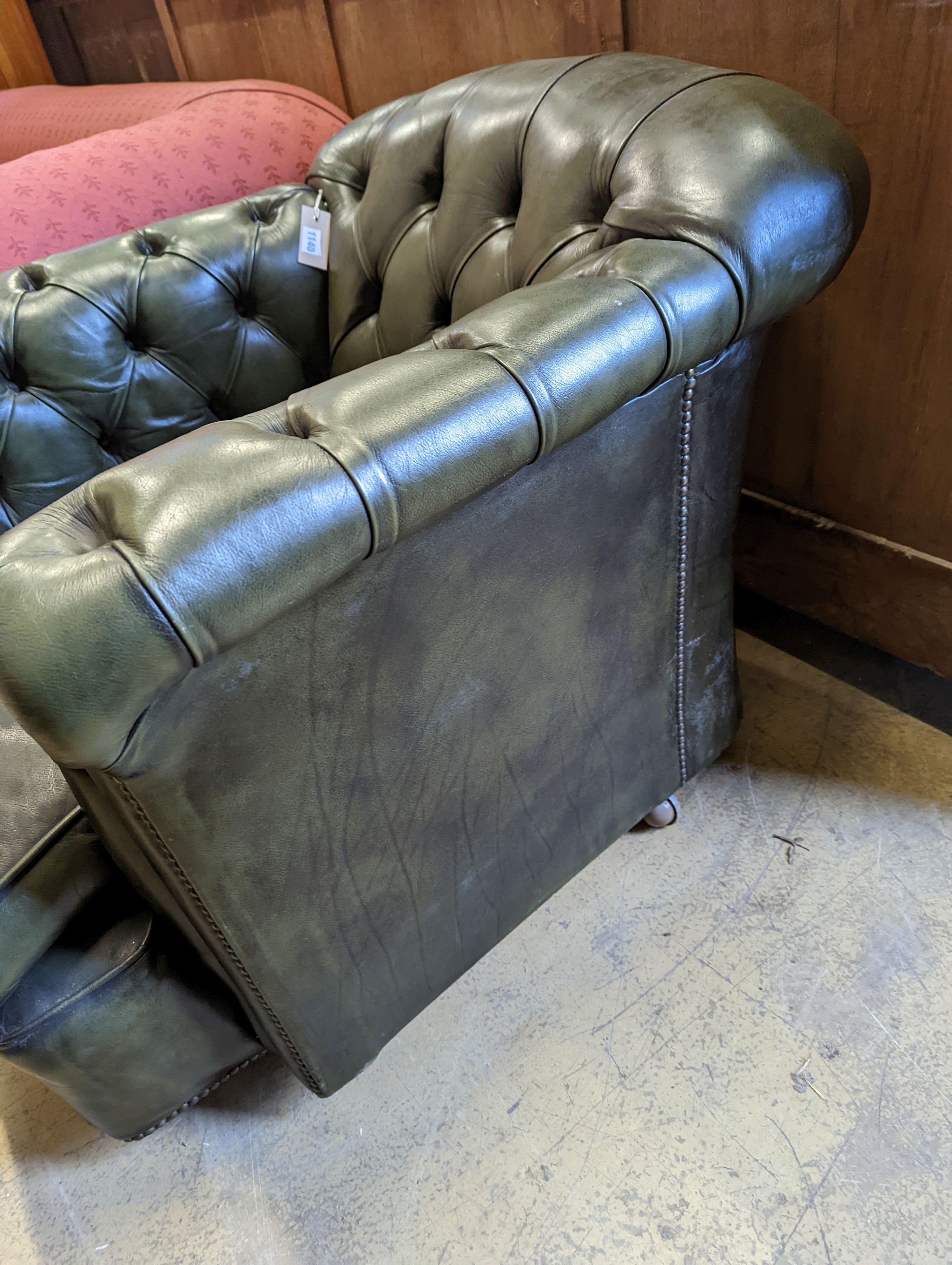 A Victorian style buttoned green leather club armchair, width 85cm, depth 100cm, height 72cm